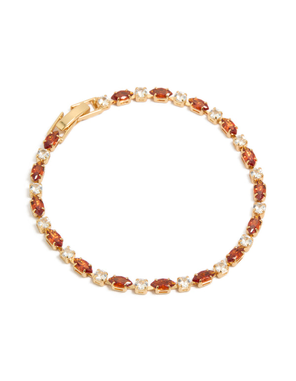 Showcasing a gold plated clear and cognac cubic zirconia multi cut tennis bracelet front view