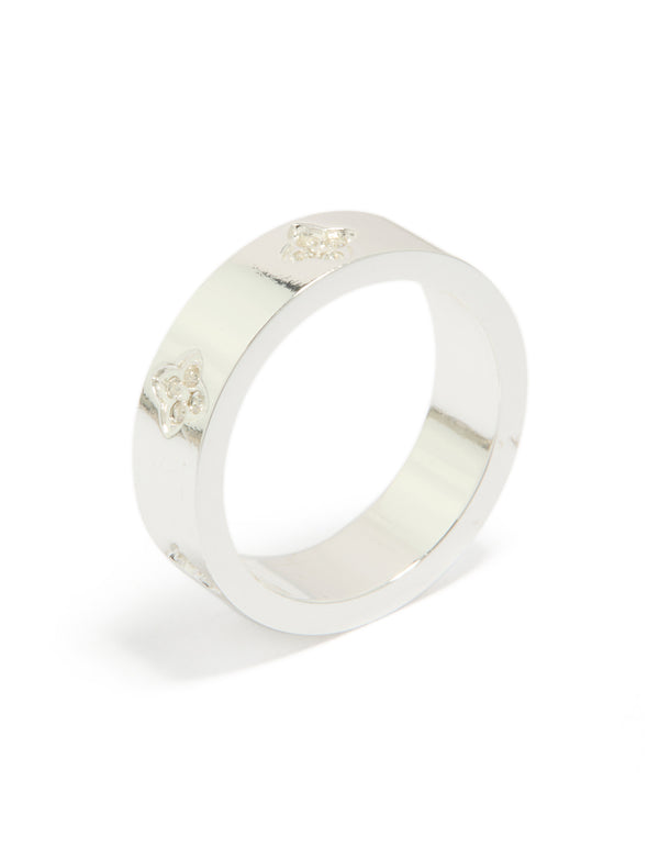 Designed with waterproof stainless steel and cubic zirconia floral feature in silver and white, dainty band ring side detail view