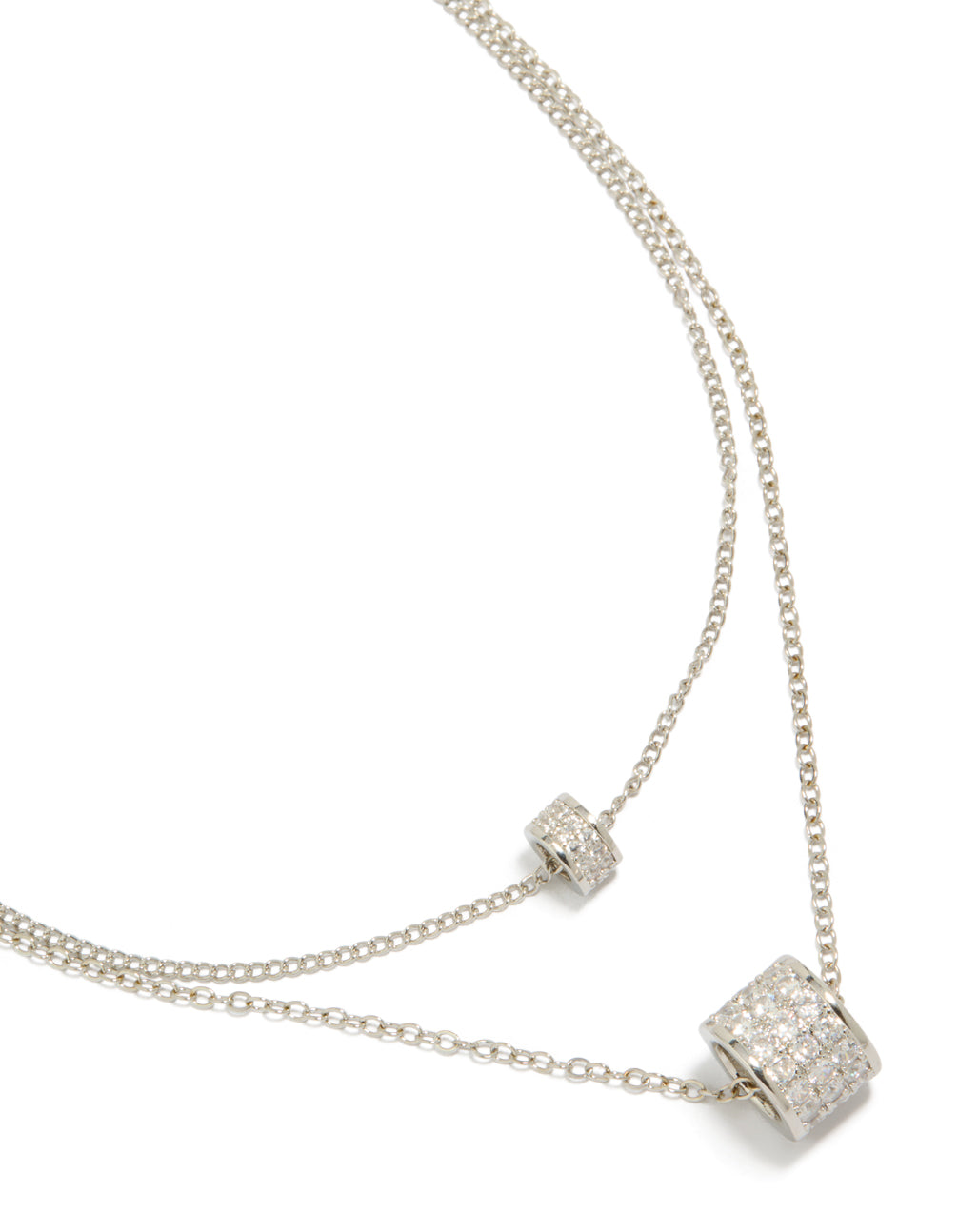 Showcasing a necklace crafted from cubic zirconia with layered rondelle design in silver close up view