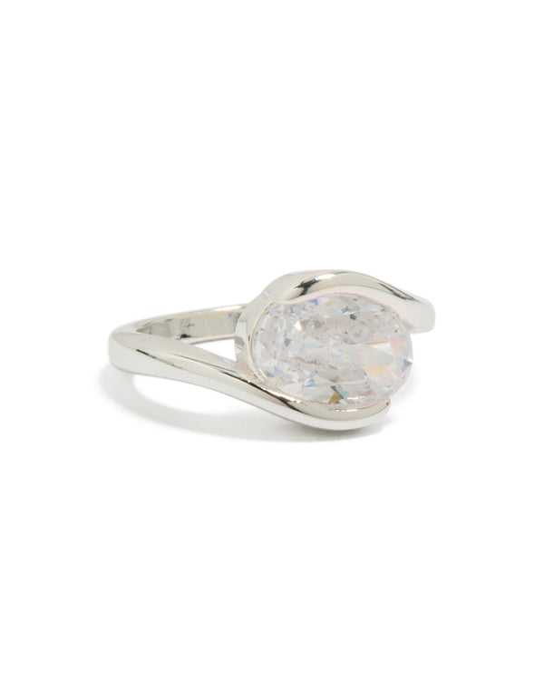 Showcasing a silver plated swivel ring with large round cubic zirconia in a statement style side detail view