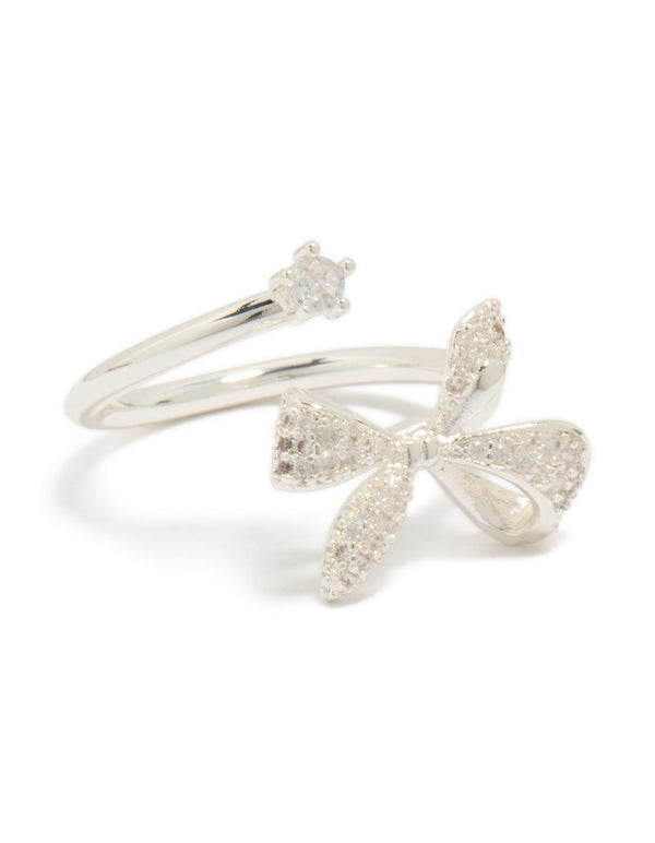 Showcasing a silver plated cubic zirconia dainty wrap bow ring clear front view