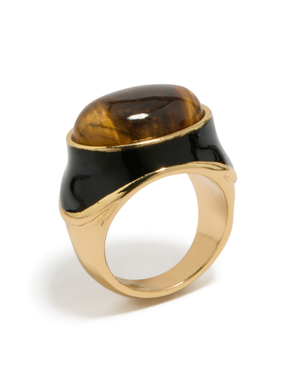 Crafted from gold plated metal featuring chunky brown stone and black enamel statement ring side detail view