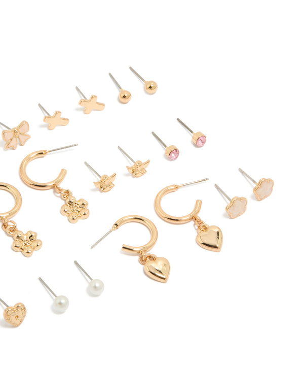 Explore this dainty stud earrings 12-pack featuring bow charm cross floral, balls and heart designs enamel crafted in gold with pearl accents white and pink details close up view