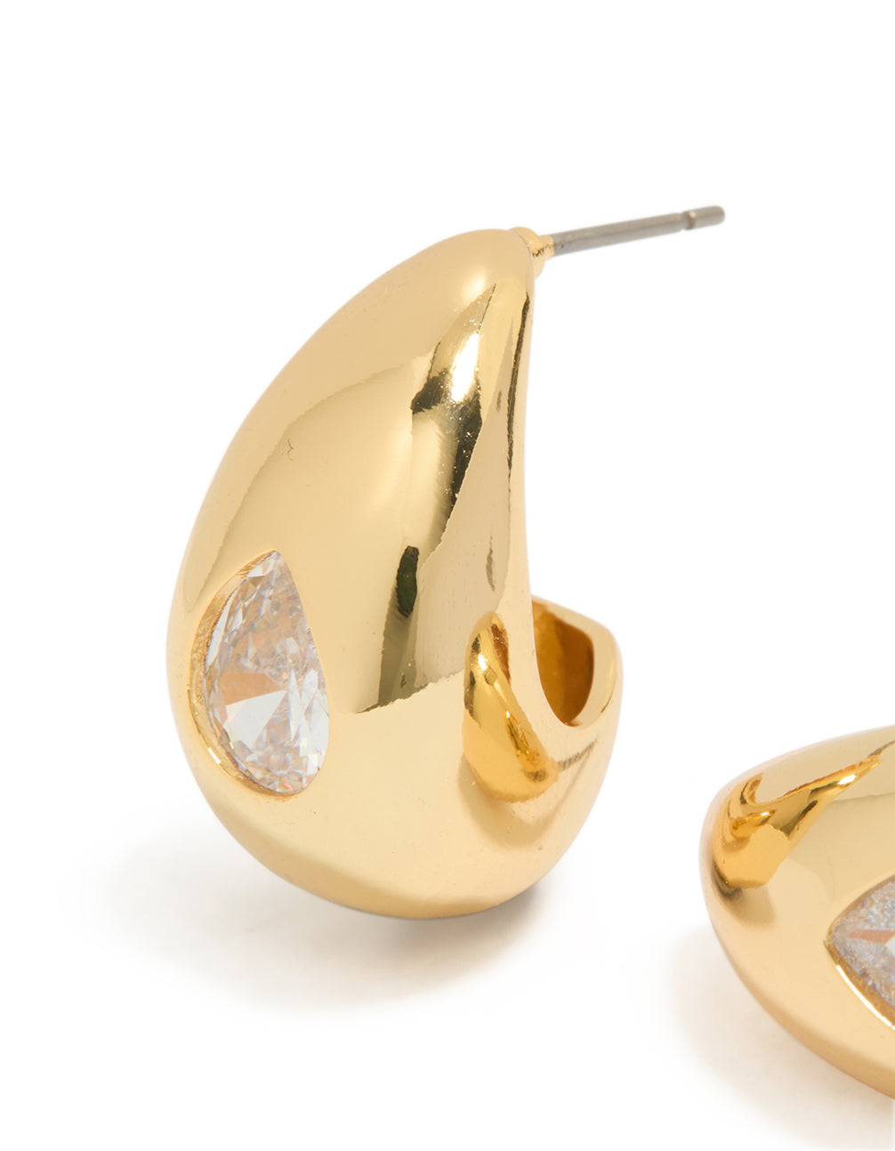 Featuring gold plated cubic zirconia teardrop hoop earrings with post detail close up view