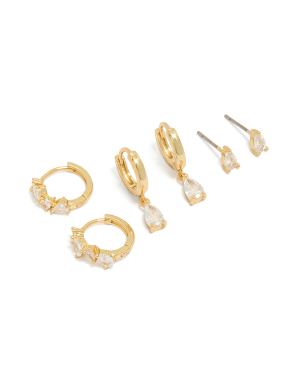 Showcasing gold plated pear cubic zirconia huggie and stud earrings in a 3-pack with crystal accents front view