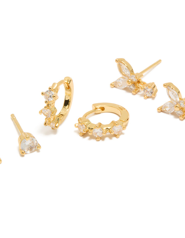 Showcasing mini butterfly hoop earrings crafted from gold plated crystal and cubic zirconia in a 3-pack with hoop stud closure close up view