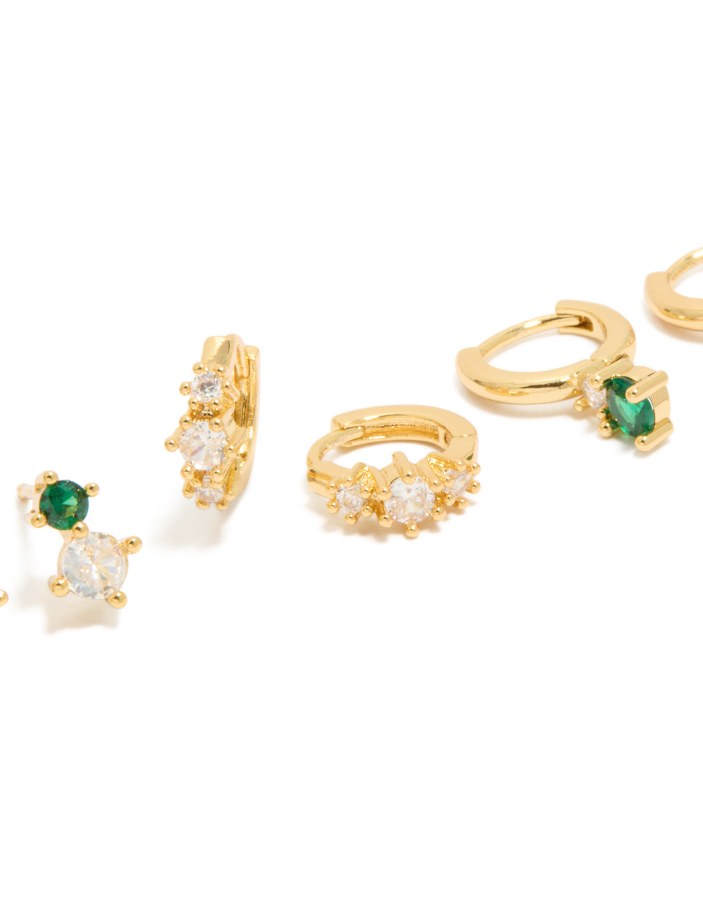 Crafted from gold plated material with green and clear cubic zirconia in stud and huggie earrings 3-pack close up view
