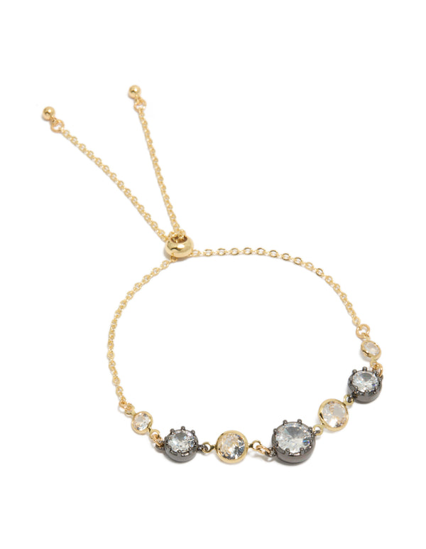 Showcasing a mixed metal toggle bracelet with cubic zirconia crystals in gold plated front view