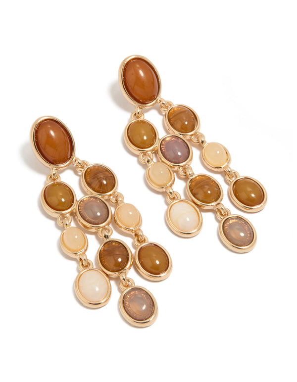Showcasing gold brown stones oval drop earrings front view