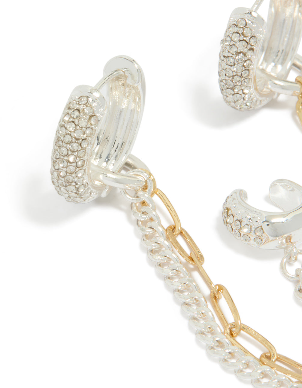 Detailed look at mixed metal plated diamante multi chain and cuff huggie earrings statement style in gold and silver close up view
