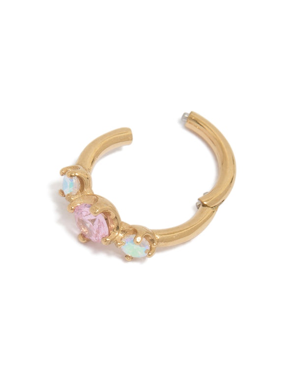 Showcasing a gold plated surgical steel multi cubic zirconia circle clicker ring with crystal in pink and aqua detail view