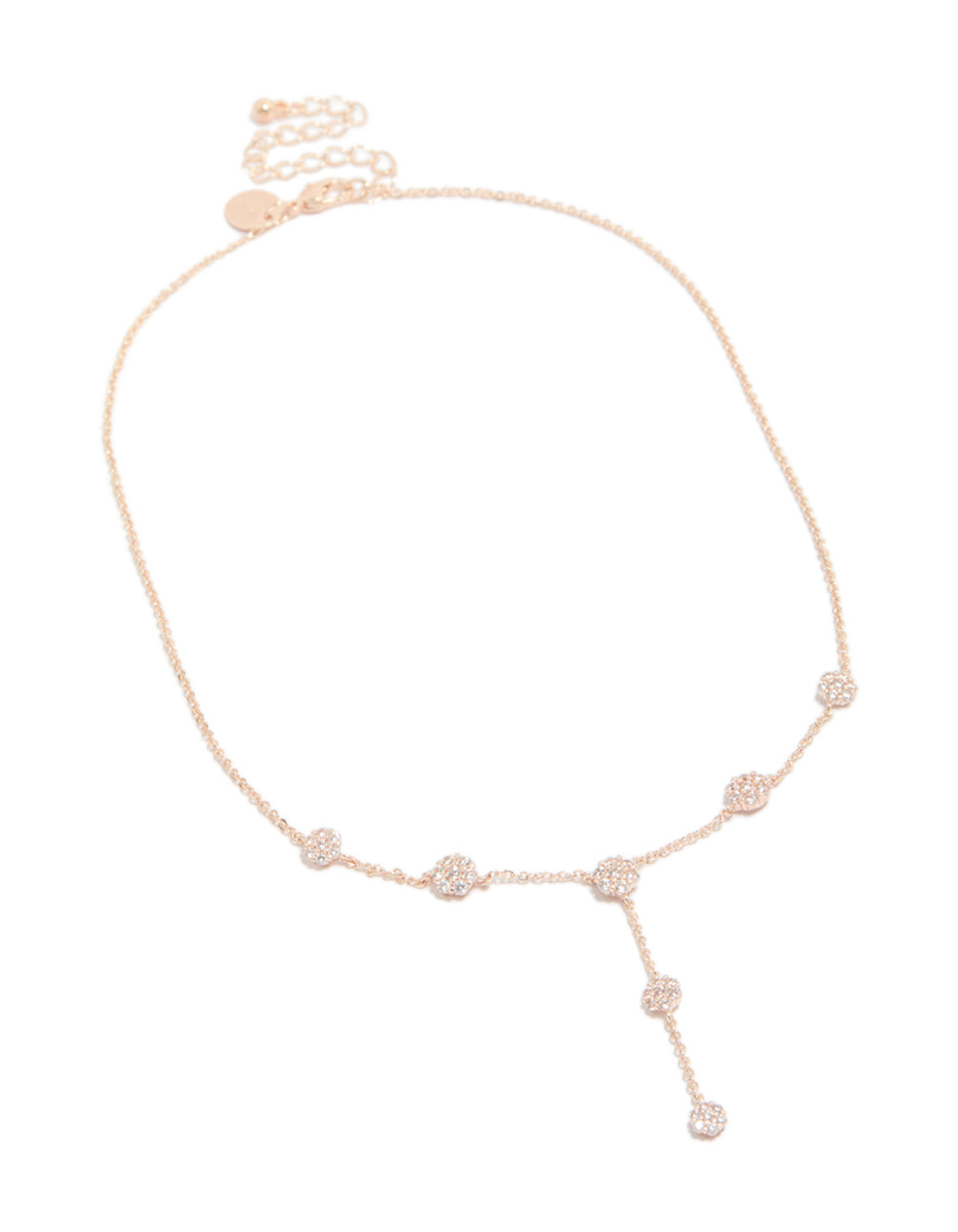 Showcasing a rose gold cubic zirconia mini floral Y-necklace with dainty detailing, close up view
