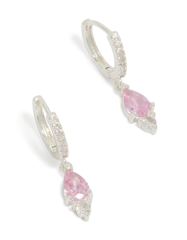 Showcasing statement huggie drop earrings crafted from silver plated metal with pink cubic zirconia front view