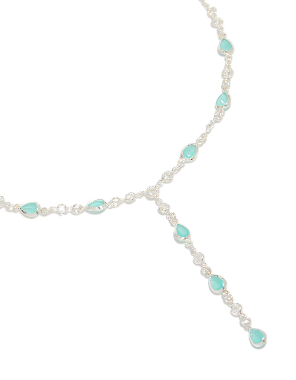 Showcasing a statement necklace crafted from plated material featuring blue alternating stones in an oval shape close up view