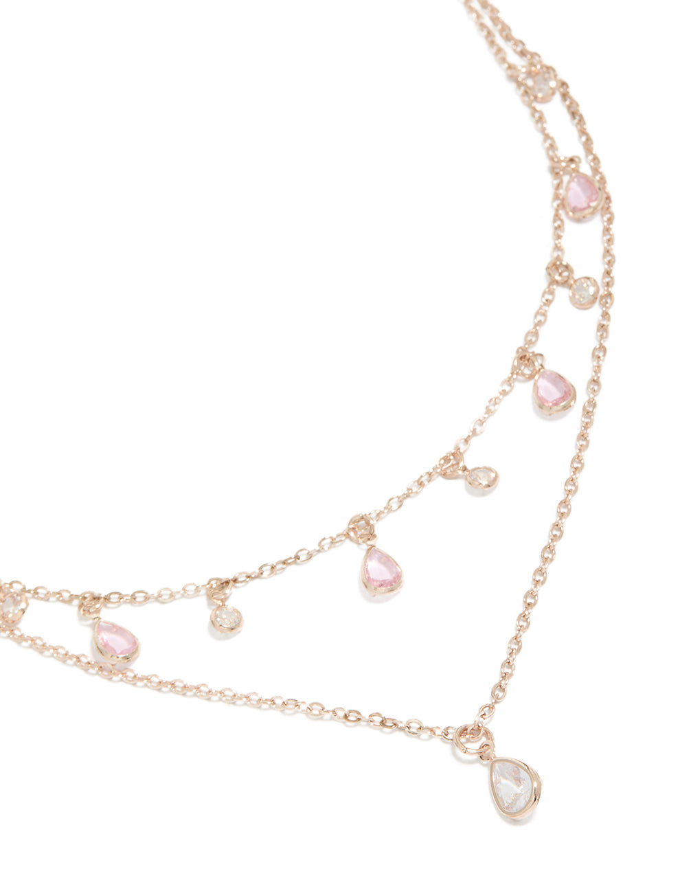 Showcasing a layered necklace with charm featuring pear stone pink and clear cubic zirconia in rose gold plated finish close up view