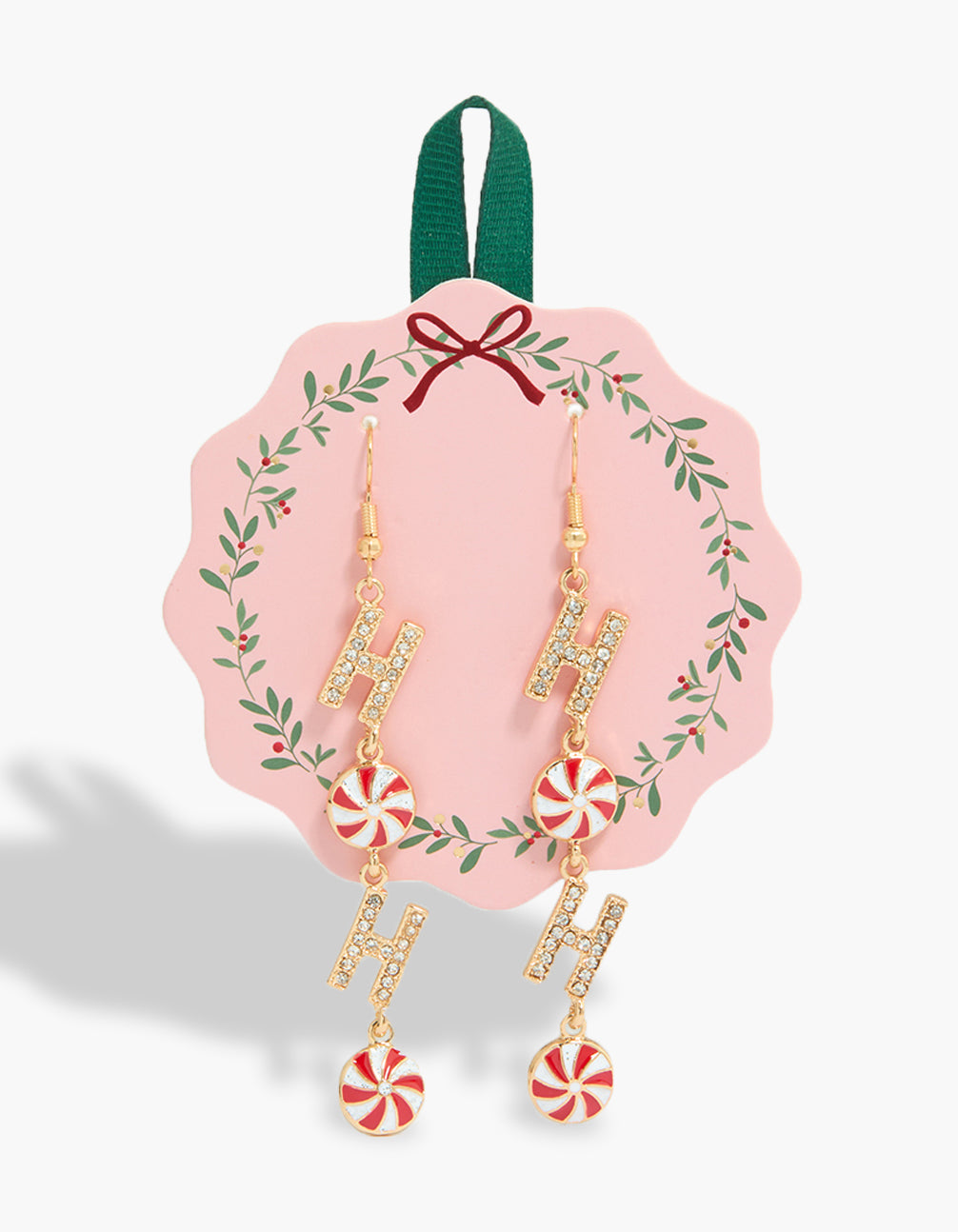 Showcasing chunky statement drop earrings with food-inspired charm featuring script letters in striped pattern with gold, red, and white colors front view