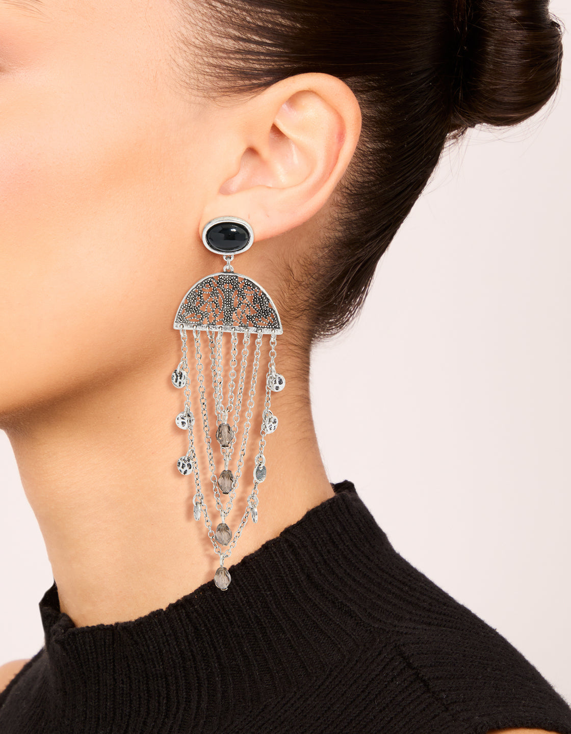 Featuring statement boho chip drop earrings with charm beads in silver on ear view