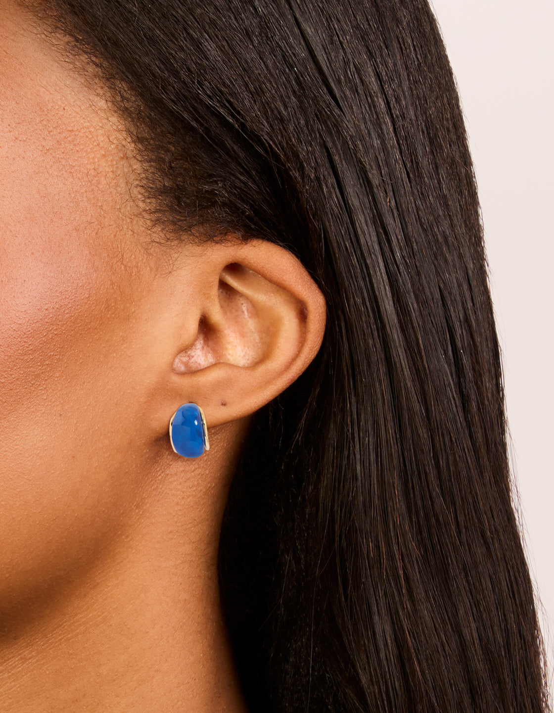 Featuring hoop earrings with acrylic bubble design in gold, red, and blue, 3-pack on ear view