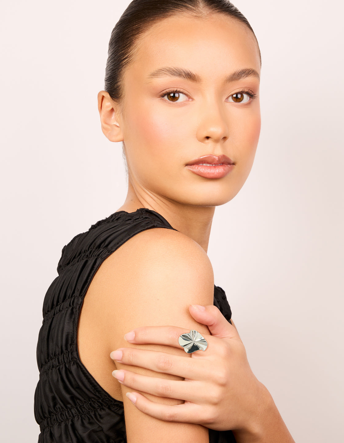 Featuring a silver plated organic fan ring in statement style on finger view