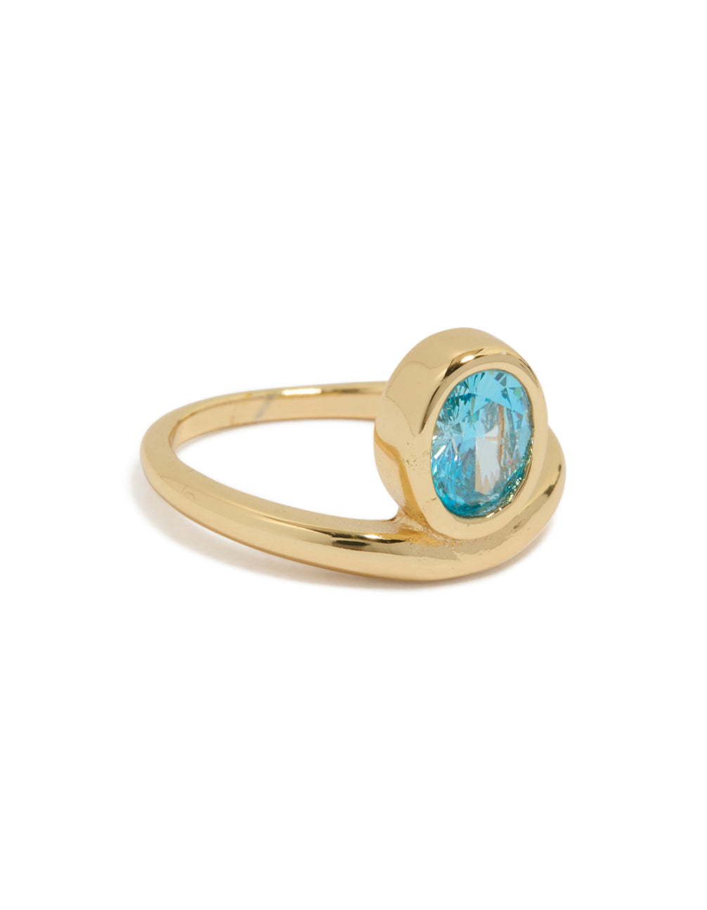 Discover this gold plated stainless steel statement ring featuring an oval blue cubic zirconia crystal front view