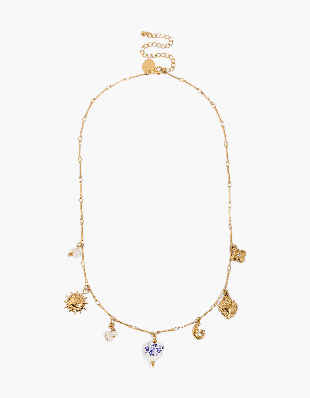 Detailed view of a waterproof stainless steel necklace with painted floral, heart, celestial charms featuring sun, moon, star, beads and cubic zirconia in gold plated finish front view