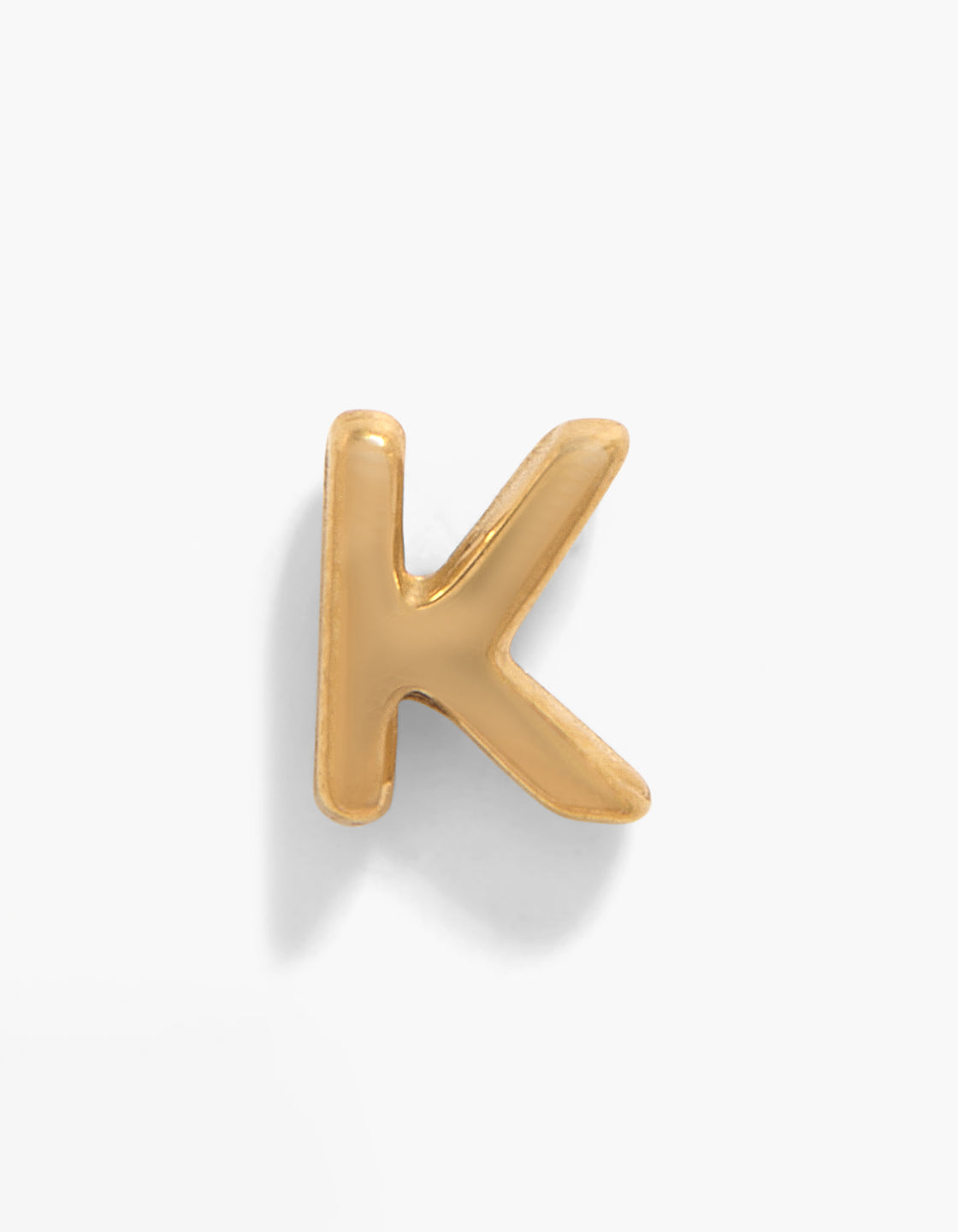 Discover the gold plated titanium K single threadless flat back stud featuring initials in gold, crafted with a flat back closure front view