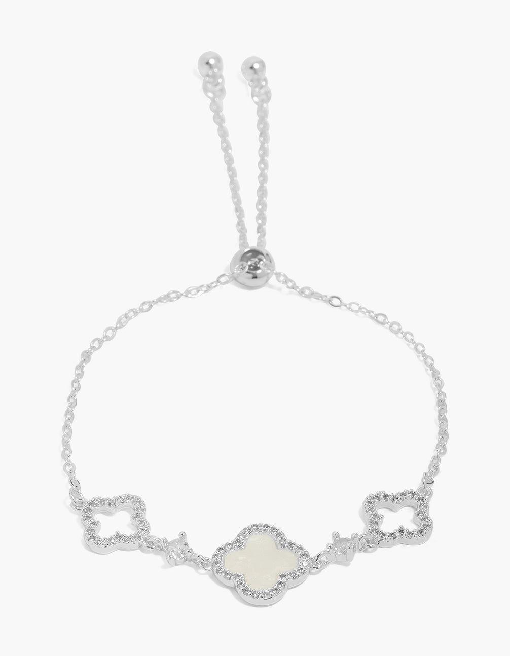 Showcasing a silver plated cubic zirconia flower trio inlay toggle bracelet with floral detailing in ivory tones front view