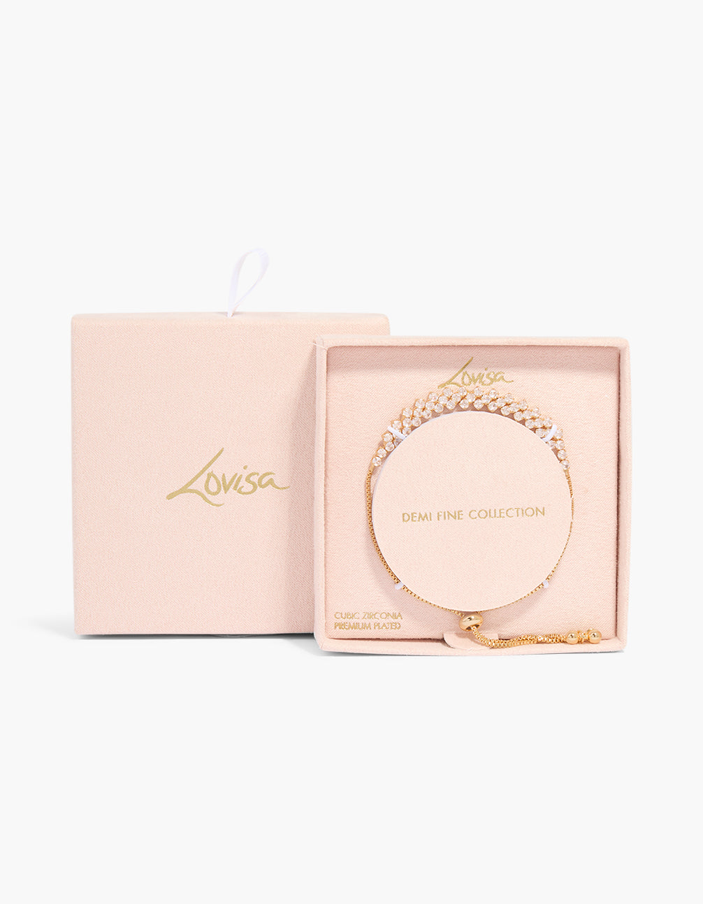 Beautifully crafted gold plated cubic zirconia layered toggle bracelet with statement design in a packaging close up view