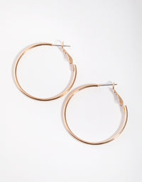 Gold Medium Core Hoop Earrings - link has visual effect only