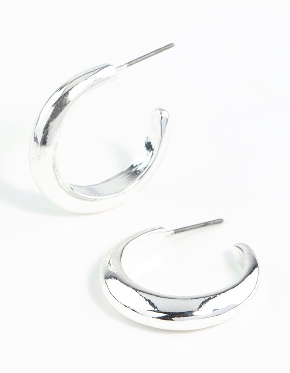 Silver Rounded Hollow Huggie Earrings