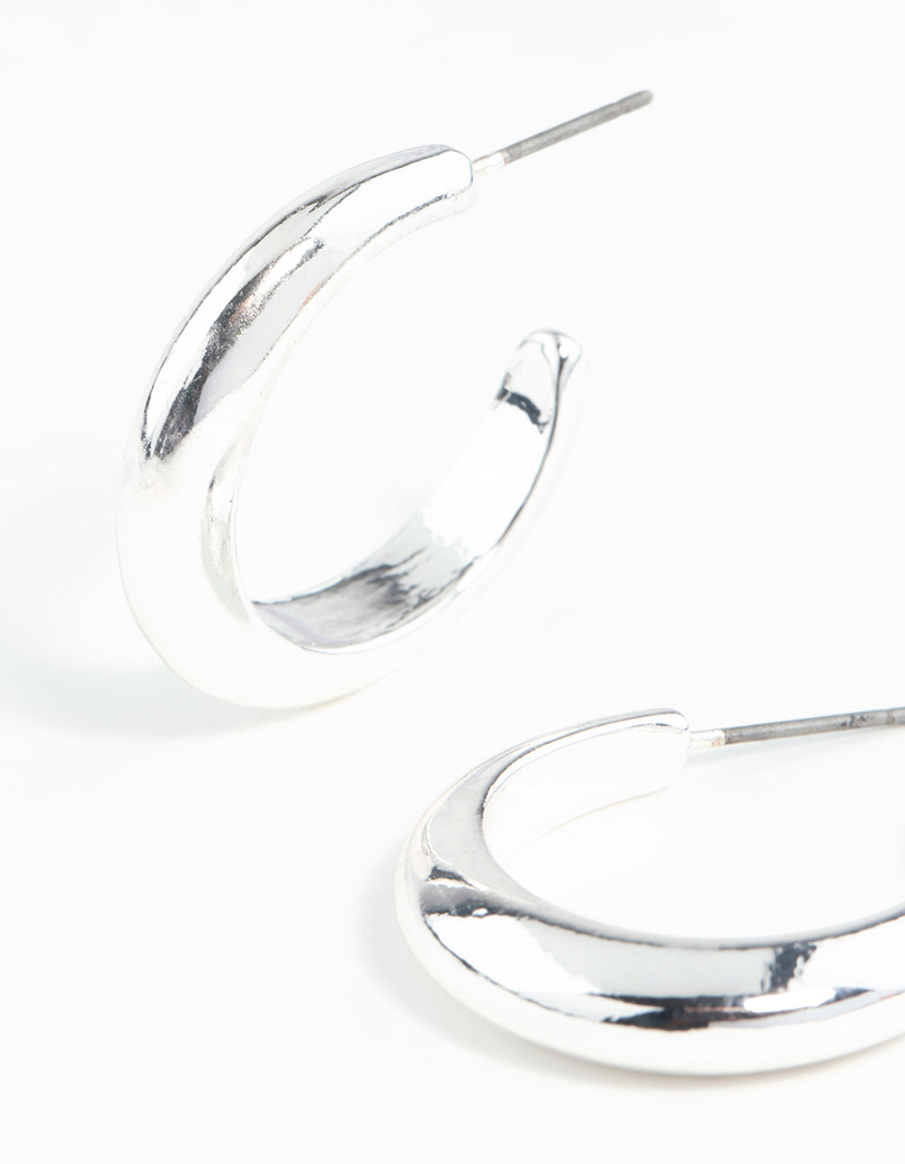 Silver Rounded Hollow Huggie Earrings
