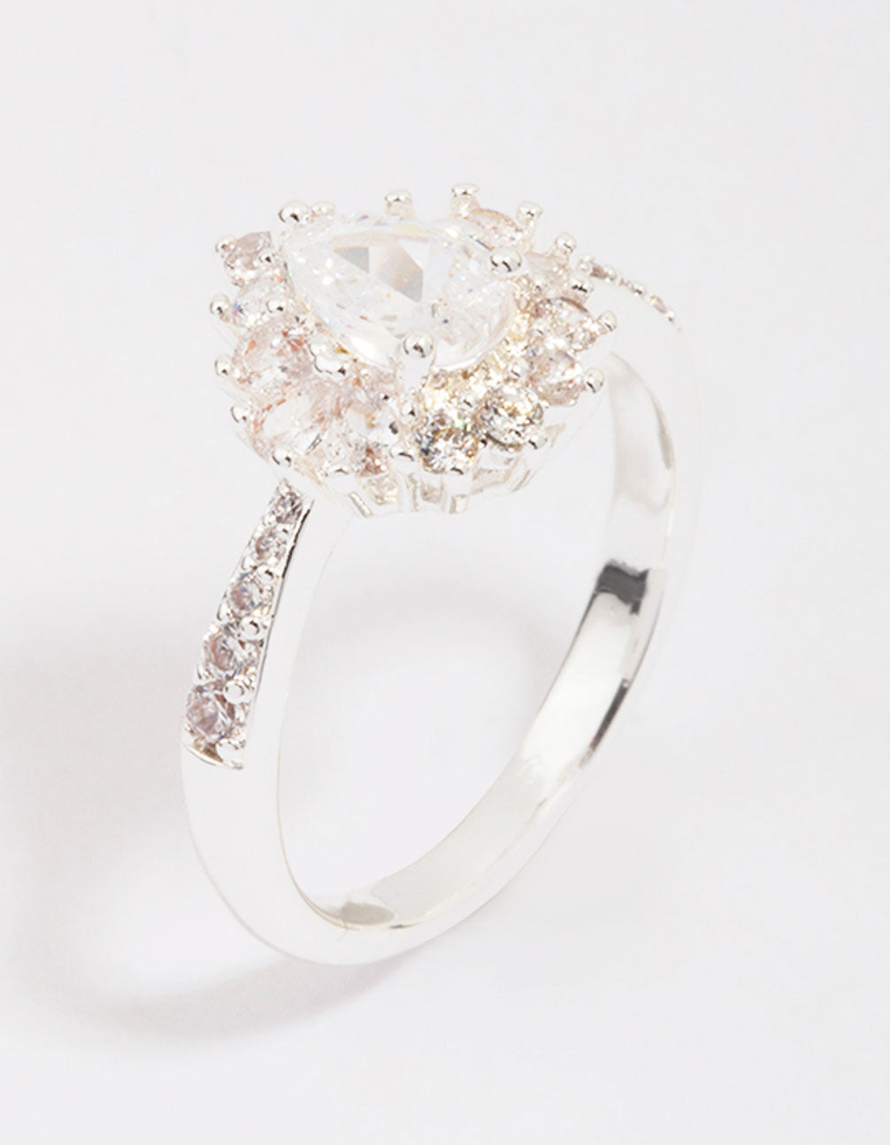 Elegant silver plated regal pear ring featuring stone cut design side detail view