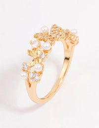Showcasing a butterfly pearl band ring featuring gold plated metal with cubic zirconia and dainty design side detail view - link has visual effect only