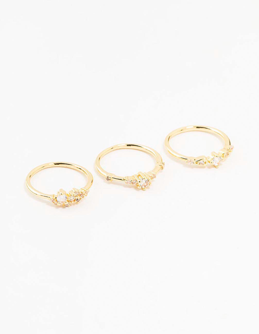 Featuring gold plated dainty cubic zirconia cluster rings in a 3-pack front view