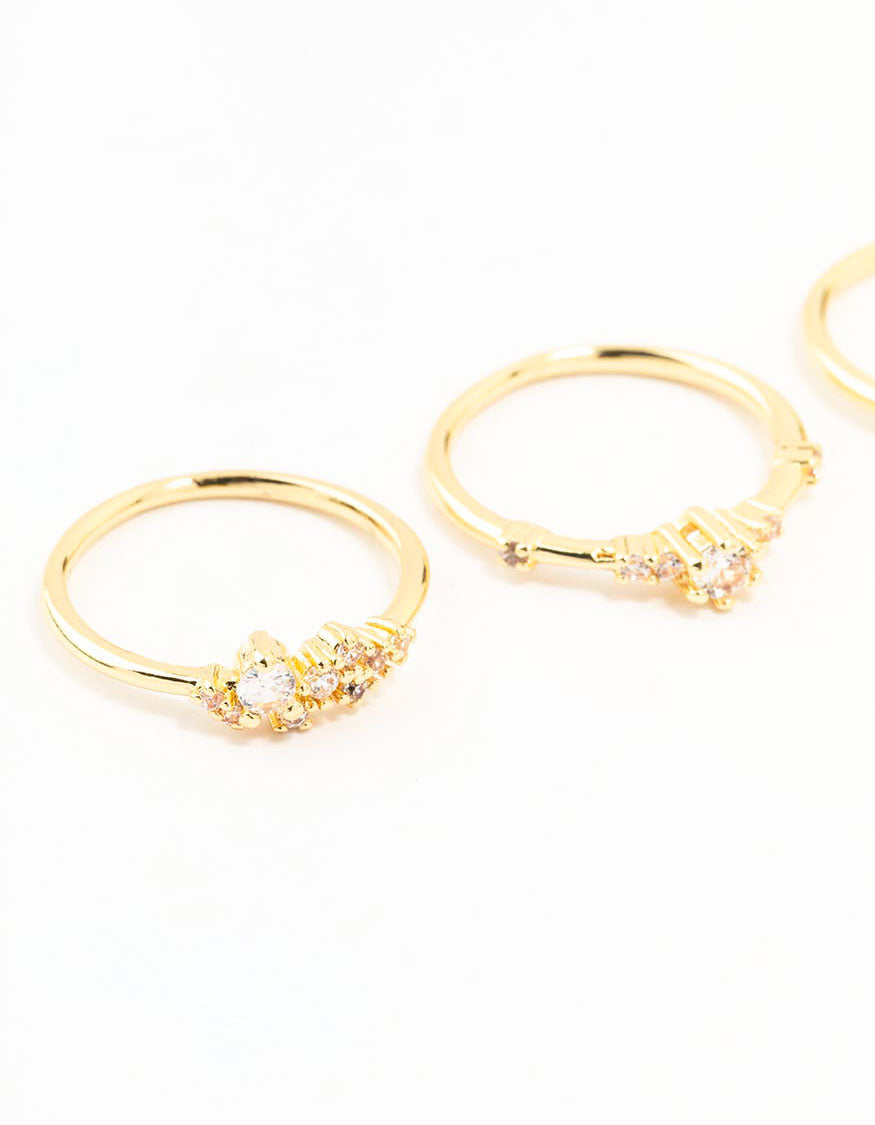 Showcasing gold plated dainty cubic zirconia cluster rings in a 3-pack close up view