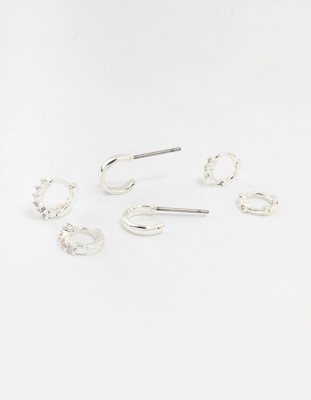 Discover statement silver mixed diamante huggie hoop earrings in a 3-pack front view