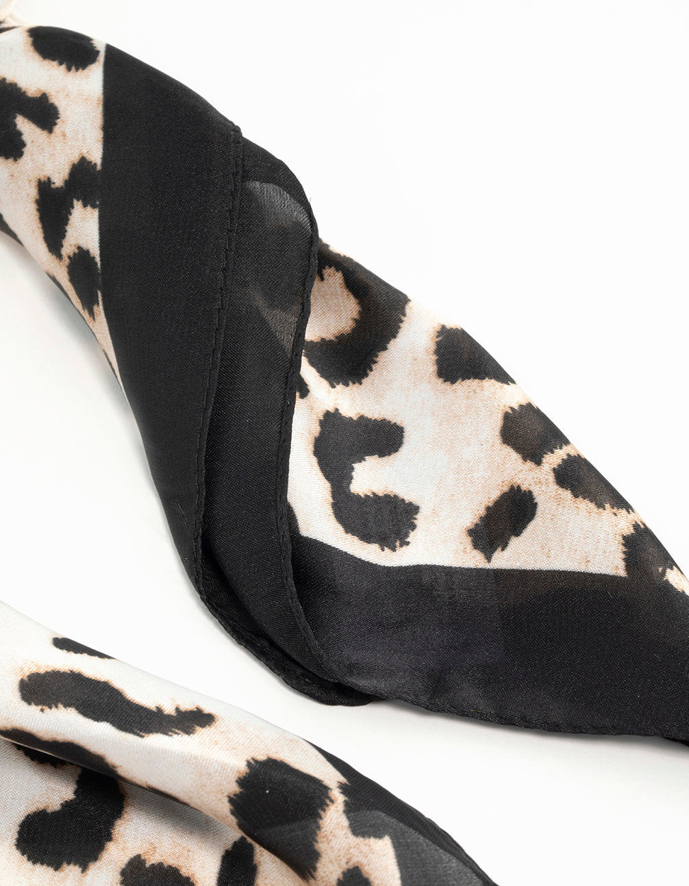Chic leopard print satin scarf crafted from fabric in black beige tan and white side view