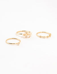 Presenting gold plated triple flower stacking rings in a 3-pack front view - link has visual effect only