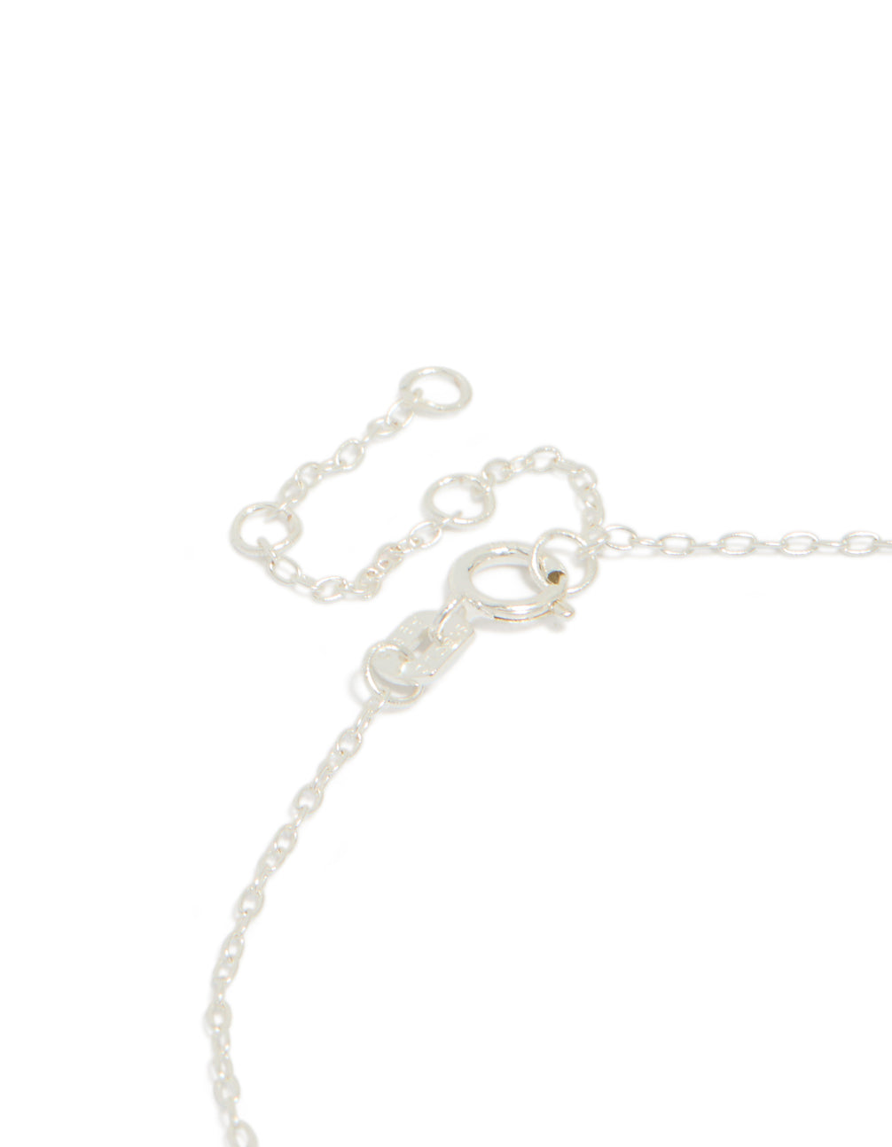 Detailed sterling silver infinity and cubic zirconia heart link bracelet in silver closure detail view