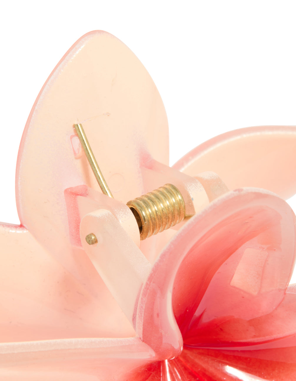 Close-up of pink ombre hibiscus flower claw clip showcasing the gold clasp mechanism in coral and peachpuff detail view