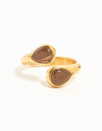 Featuring a waterproof gold plated stainless steel double pear stone ring close up view - link has visual effect only