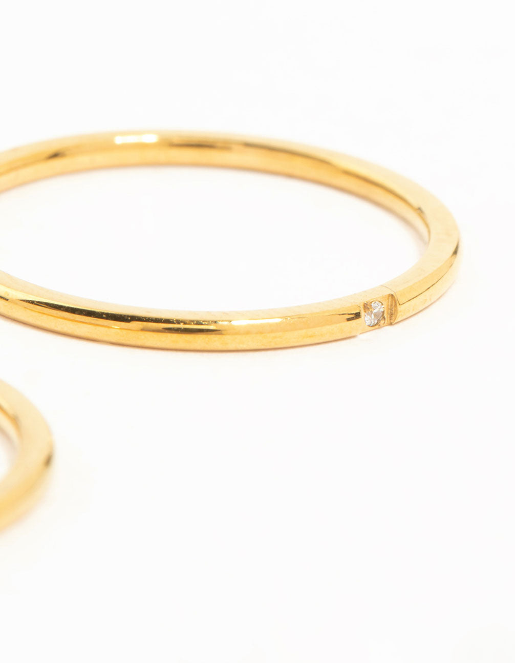 Featuring waterproof gold plated stainless steel construction, these fine band rings come in a 2-pack side detail view