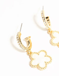 Detailed view of gold plated flower drop diamante hoop earrings in white close up view - link has visual effect only