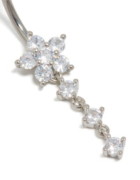 Detailed look at a titanium belly bar with floral charm featuring round cut cubic zirconia in silver and clear detail view - link has visual effect only