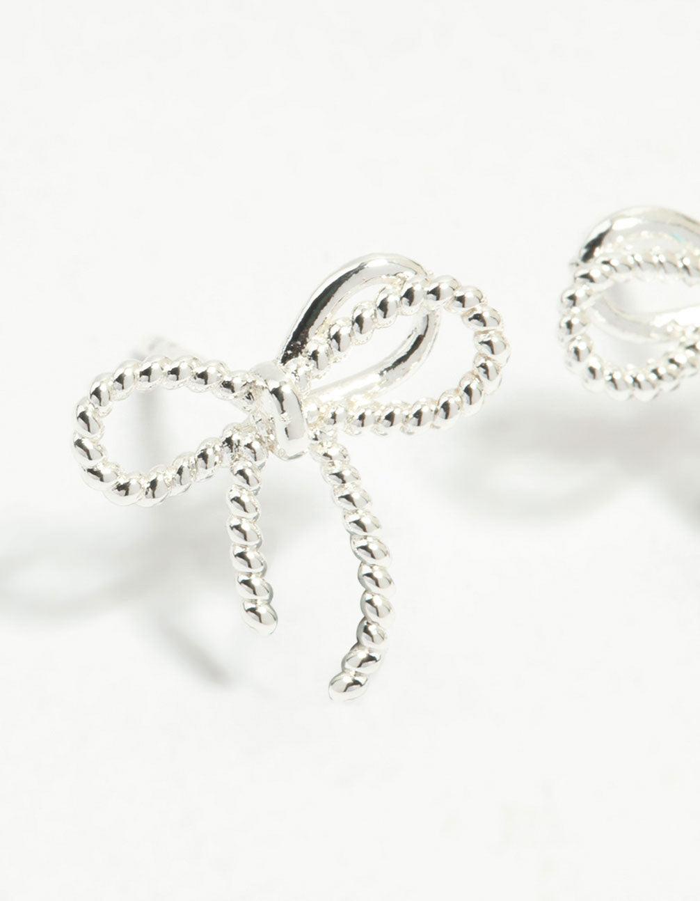 Sterling Silver Textured Thin Bow Stud Earrings