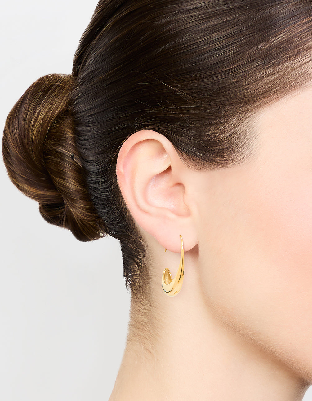 Featuring waterproof gold plated stainless steel thick half hoop earrings with statement design on ear view