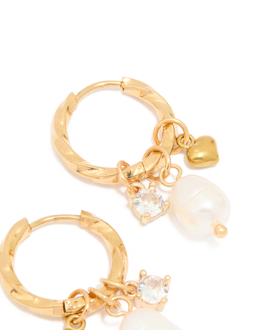 Displaying waterproof gold plated stainless steel twist hoop earrings featuring freshwater pearl and heart charm post detail view