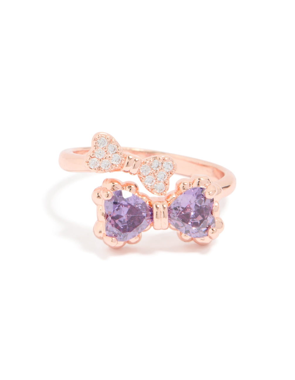 Crafted from rose gold, this cubic zirconia dainty bow ring with heart feature close up view