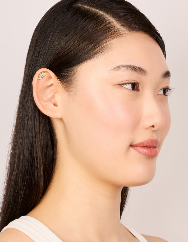 Highlighting gold plated sterling silver cubic zirconia marquise drop single flat back stud earrings on model view