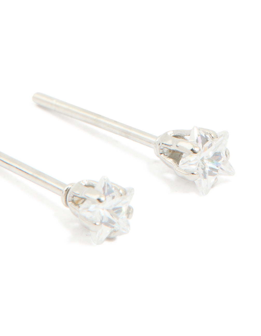 Highlighting celestial waterproof stainless steel prism cubic zirconia star stud earrings in 4 MM silver and clear post detail view